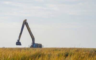 What Is a Digger Derrick and How Is It Used in Wetland Utility Work?